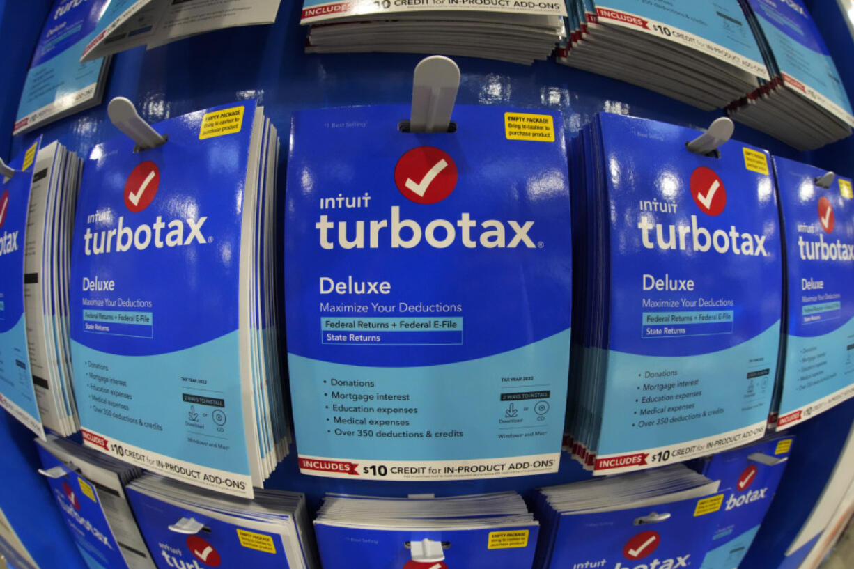 FILE - TurboTax is displayed in a Costco warehouse in Pittsburgh on Jan. 26, 2023. It&rsquo;s tax season in the U.S., and for many people, filing tax returns can be a daunting task that&rsquo;s often left until the last minute. (AP Photo/Gene J.