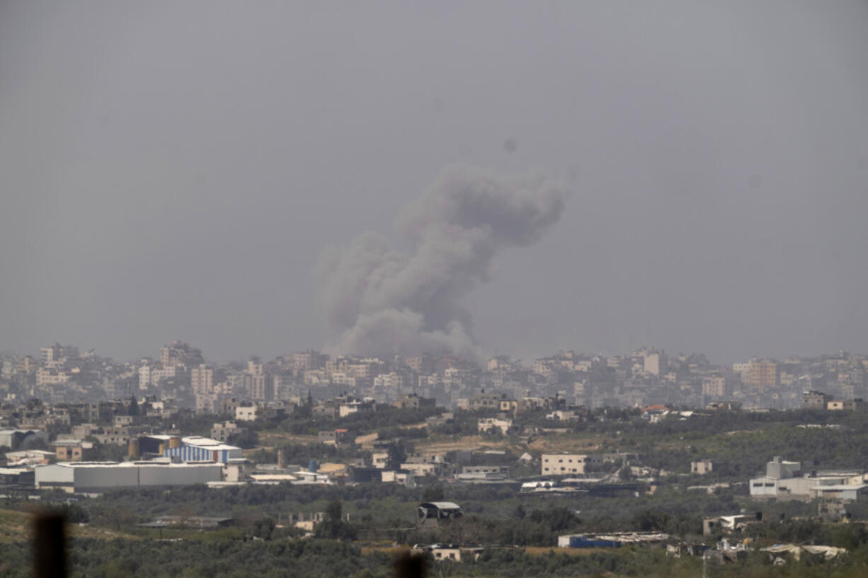Smoke rises following an explosion in the Gaza Strip as seen from southern Israel, Wednesday, March 27, 2024.