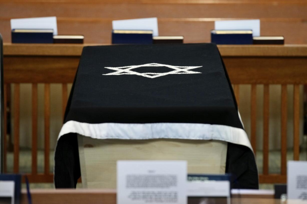 The casket of former Senator Joe Lieberman is shown in the sanctuary of Congregation Agudath Sholom, before his funeral in Stamford, Conn., Friday, March. 29, 2024.