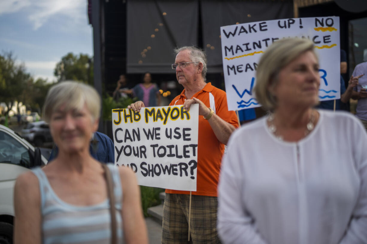 Residents of the Blairgowrie neighbourhood of Johannesburg, South Africa, demonstrate against the lack of service delivery Tuesday, March 12, 2024. In addition to daily electricity load shedding, the residents have been without water for 10 days, an issue that will be on the top of the agenda for the May 29 general elections.