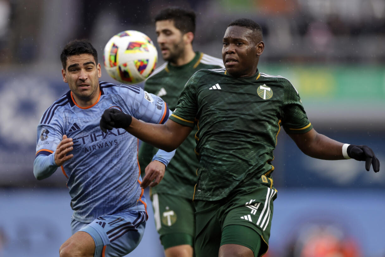 Portland Timbers defender Kamal Miller (4) tracks down a ball against the New York City FC during an MLS soccer match, Saturday, March 9, 2024, in New York.