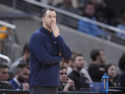 Utah State&rsquo;s Danny Sprinkle coaches against Purdue in the NCAA Tournament, Sunday in Indianapolis.