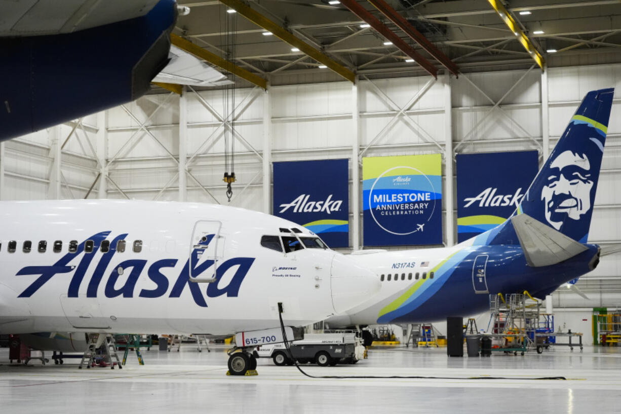 Alaska Airlines aircraft sit in the airline&rsquo;s hangar at Seattle-Tacoma International Airport Wednesday, Jan. 10, 2024, in SeaTac, Wash. Boeing has acknowledged in a letter to Congress that it cannot find records for work done on a door panel that blew out on an Alaska Airlines flight over Oregon two months ago. Ziad Ojakli, Boeing executive vice president and chief government lobbyist, wrote to Sen.