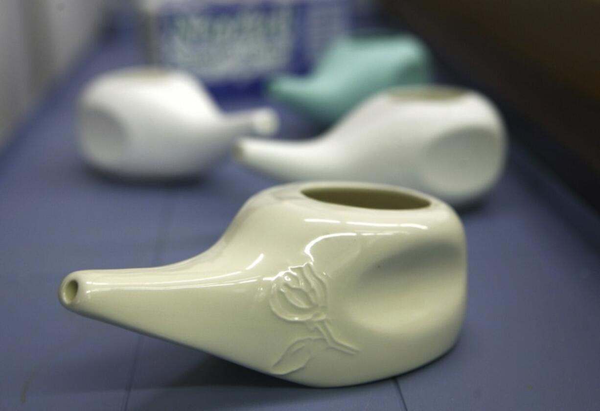 FILE - Neti pots are seen, Jan. 30, 2008, in Lexington, Ky. The Centers for Disease Control and Prevention on Wednesday, March 13, 2024, published a report that for the first time connects Acanthamoeba infections to use of Neti pots and other nasal rinsing devices.