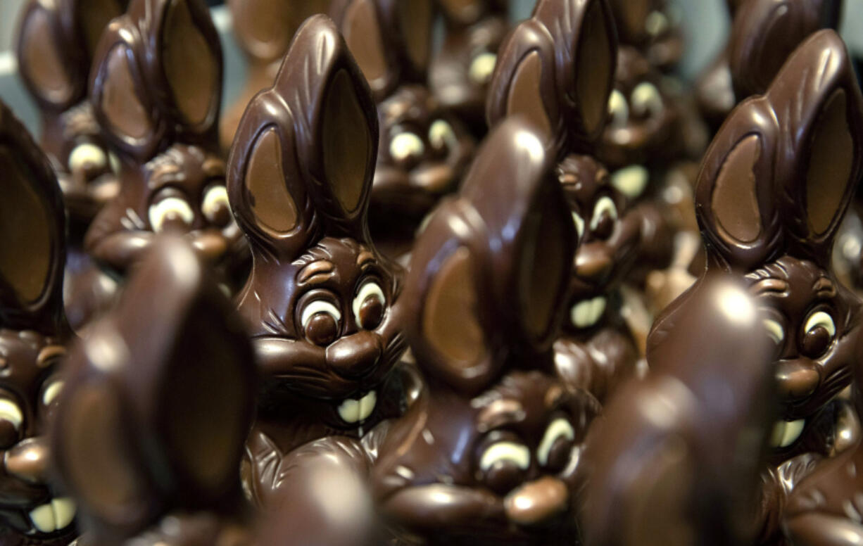 Chocolate rabbits wait to be decorated at the Cocoatree chocolate shop in Lonzee, Belgium. Sweet Easter baskets will likely come at a bitter cost this year for consumers as the price of cocoa climbs to record highs.