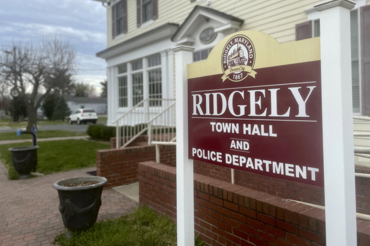 The sign outside the town government and police department offices stands in Ridgely, Md., Friday, March 15, 2024. Ridgely officials announced last week that their entire police department had been suspended pending the results of an investigation by state prosecutors.