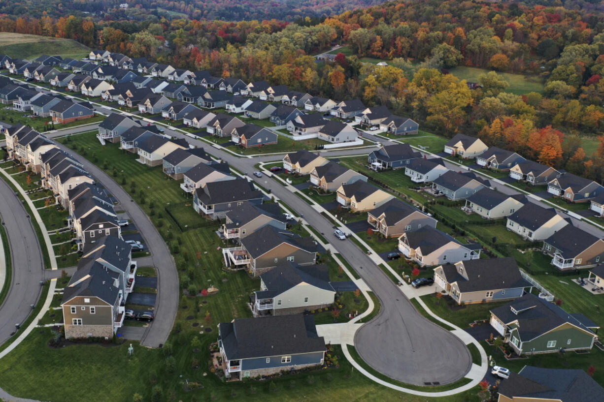 FILE - A new housing development in Middlesex Township, Pa., is shown on Oct. 12, 2022. The cost of hiring a real estate agent to buy or sell a home is poised to change along with decades-old rules that have helped determine broker commissions. (AP Photo/Gene J.