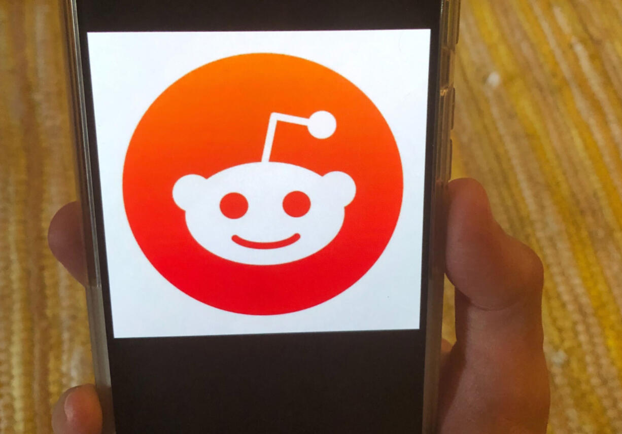 FILE - The Reddit logo is displayed on a mobile device in New York, June 29, 2020.  Reddit, that vast, lively and sometimes borderline shambolic repository of internet discussion, said Monday, March 11, 2024, that its pending initial public offering may be worth almost three quarters of a billion dollars.