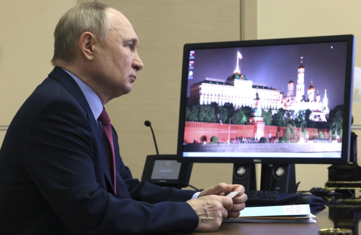 Russian President Vladimir Putin kicks off the construction of the 7th power unit of the Leningrad NPP and the construction of the high-speed railway Moscow - St. Petersburg via videoconference at the Novo-Ogaryovo state residence outside Moscow, Russia, Thursday, March 14, 2024.