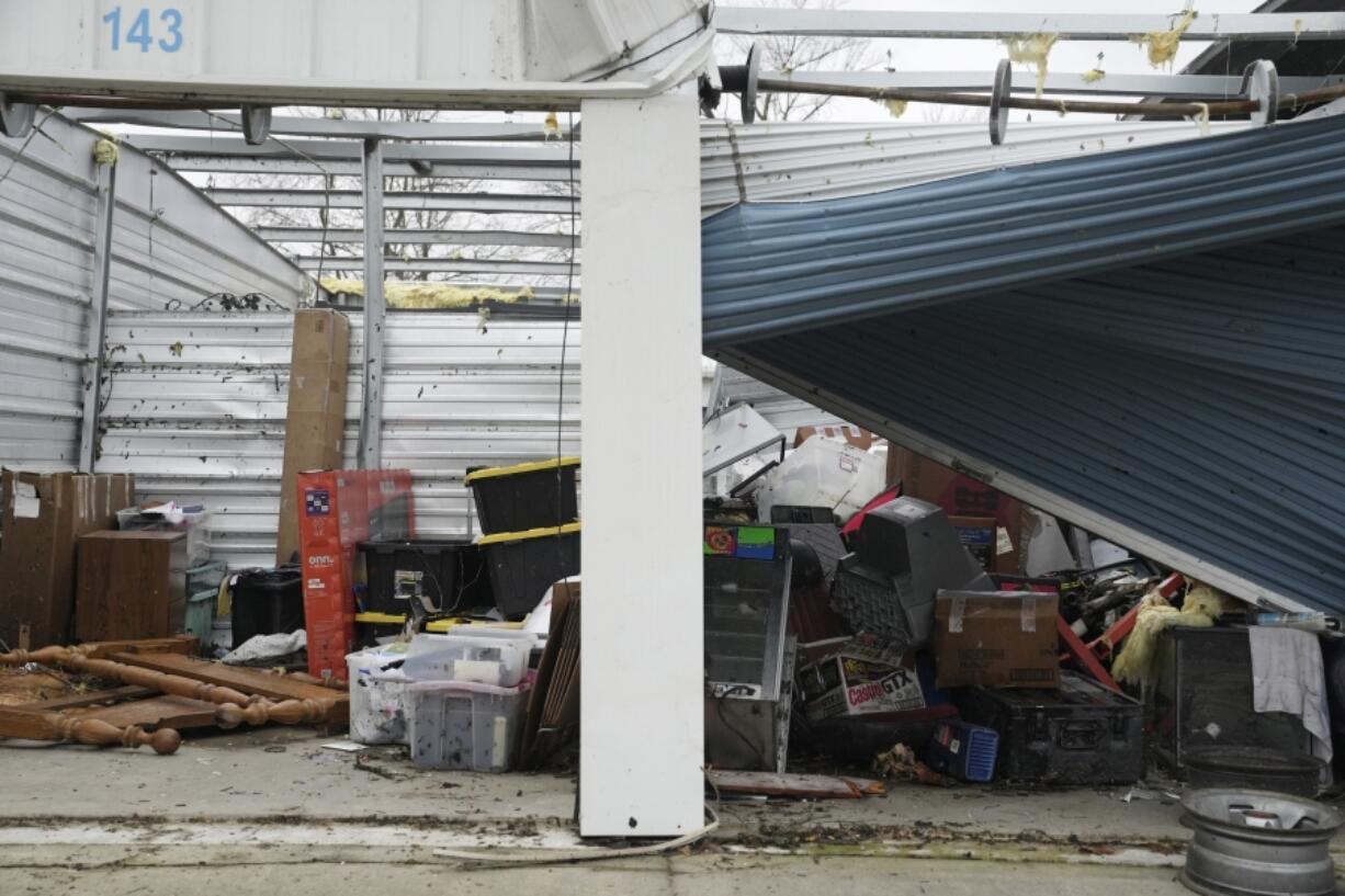 A damaged storage unit is visible following a severe storm Friday, March 15, 2024, in Lakeview, Ohio. (AP Photo/Joshua A.