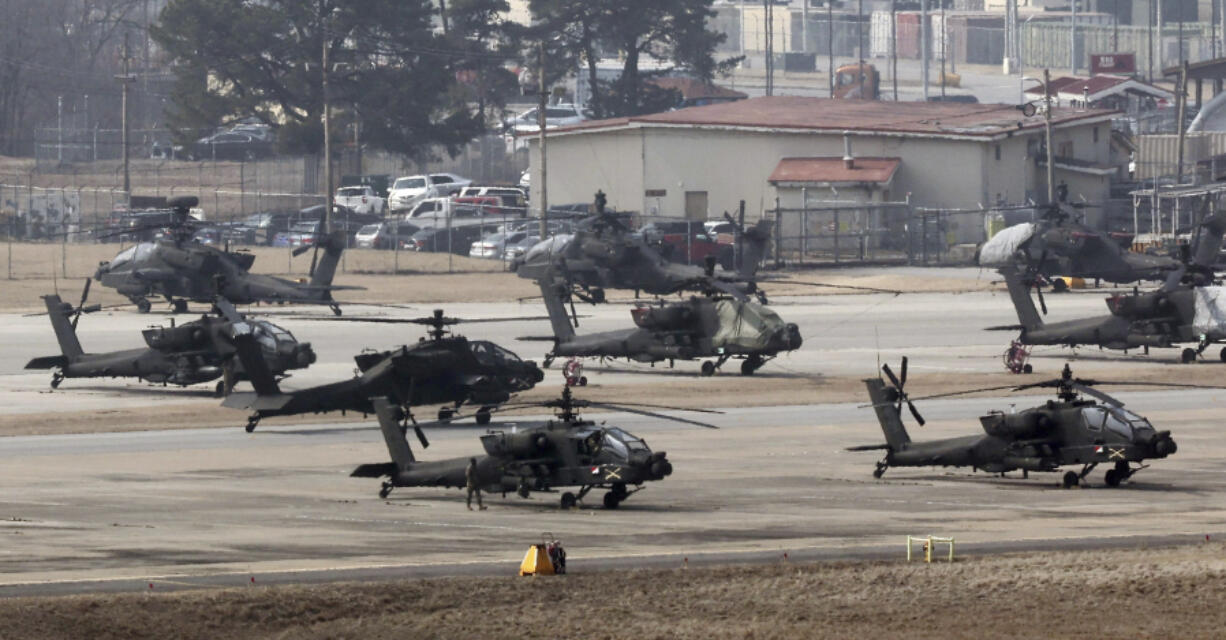 U.S. Army Apache helicopters take off at Camp Humphreys in Pyeongtaek, South Korea, Monday, March 4, 2024. North Korea called the ongoing South Korean-U.S. military drills a plot to invade the country, as it threatened Tuesday to take unspecified &ldquo;responsible&rdquo; military steps in response.