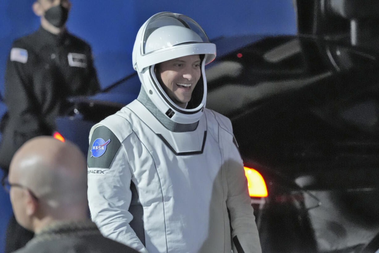 Pilot Michael Barratt smiles as he talks to family members as he leaves the Operations and Checkout building for a trip to Launch Pad 39-A, Sunday, March 3, 2024, at the Kennedy Space Center in Cape Canaveral, Fla. Four astronauts are scheduled to liftoff on a trip to the International Space Station.