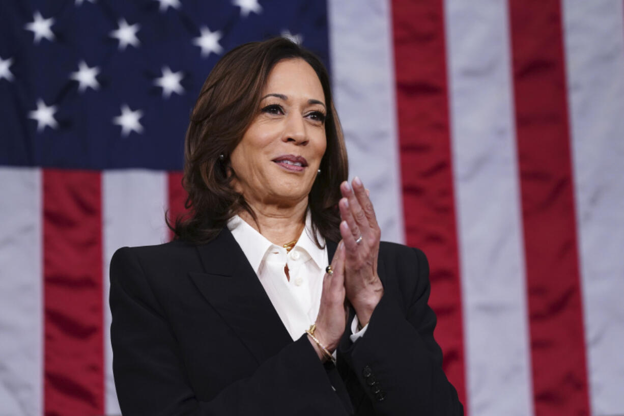 Vice President Kamala Harris claps before President Joe Biden delivers the State of the Union address to a joint session of Congress at the Capitol, Thursday, March 7, 2024, in Washington.