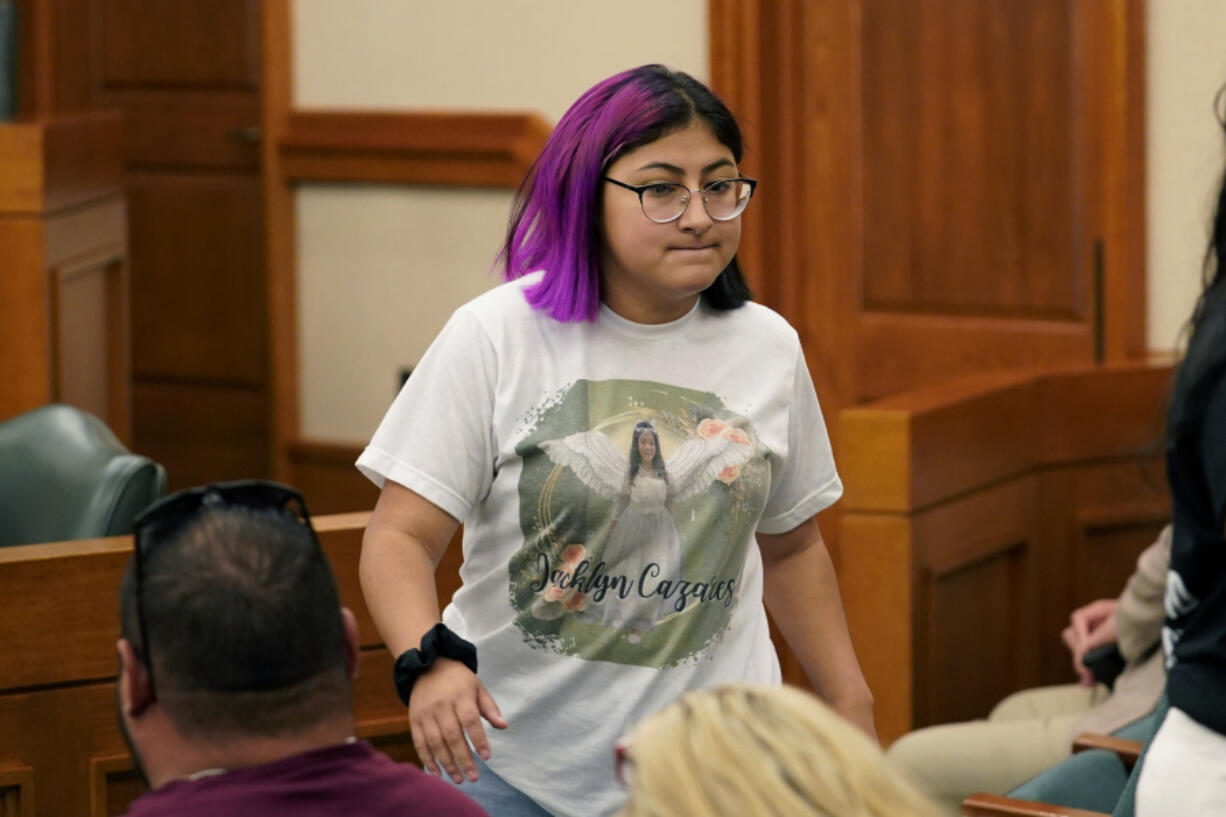 FILE - Jazmin Cazares, whose young sister Jacklyn was was one of 19 children killed at Robb Elementary School, attends a hearing at the state capitol, June 23, 2022, in Austin, Texas.