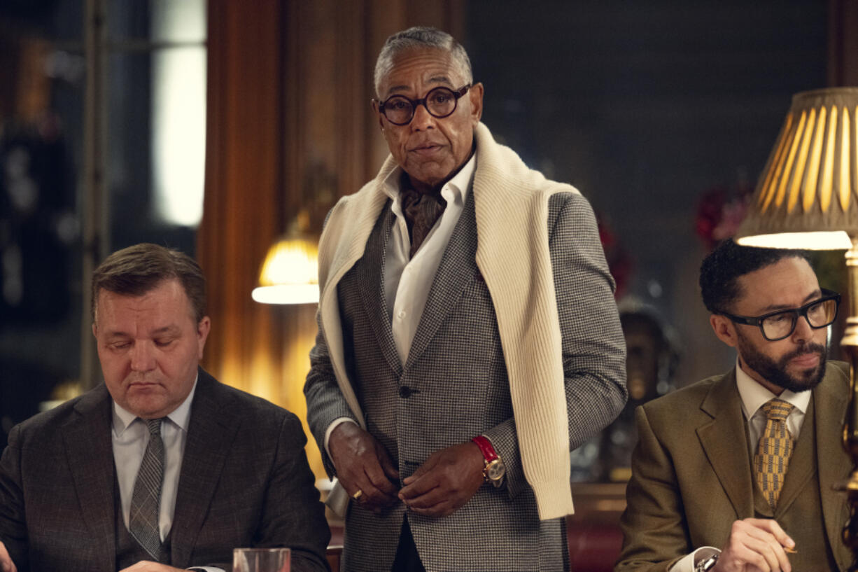 This image released by Netflix shows Giancarlo Esposito, center, from the Netflix series &ldquo;The Gentlemen.&rdquo; (Kevin Baker/Netflix via AP)
