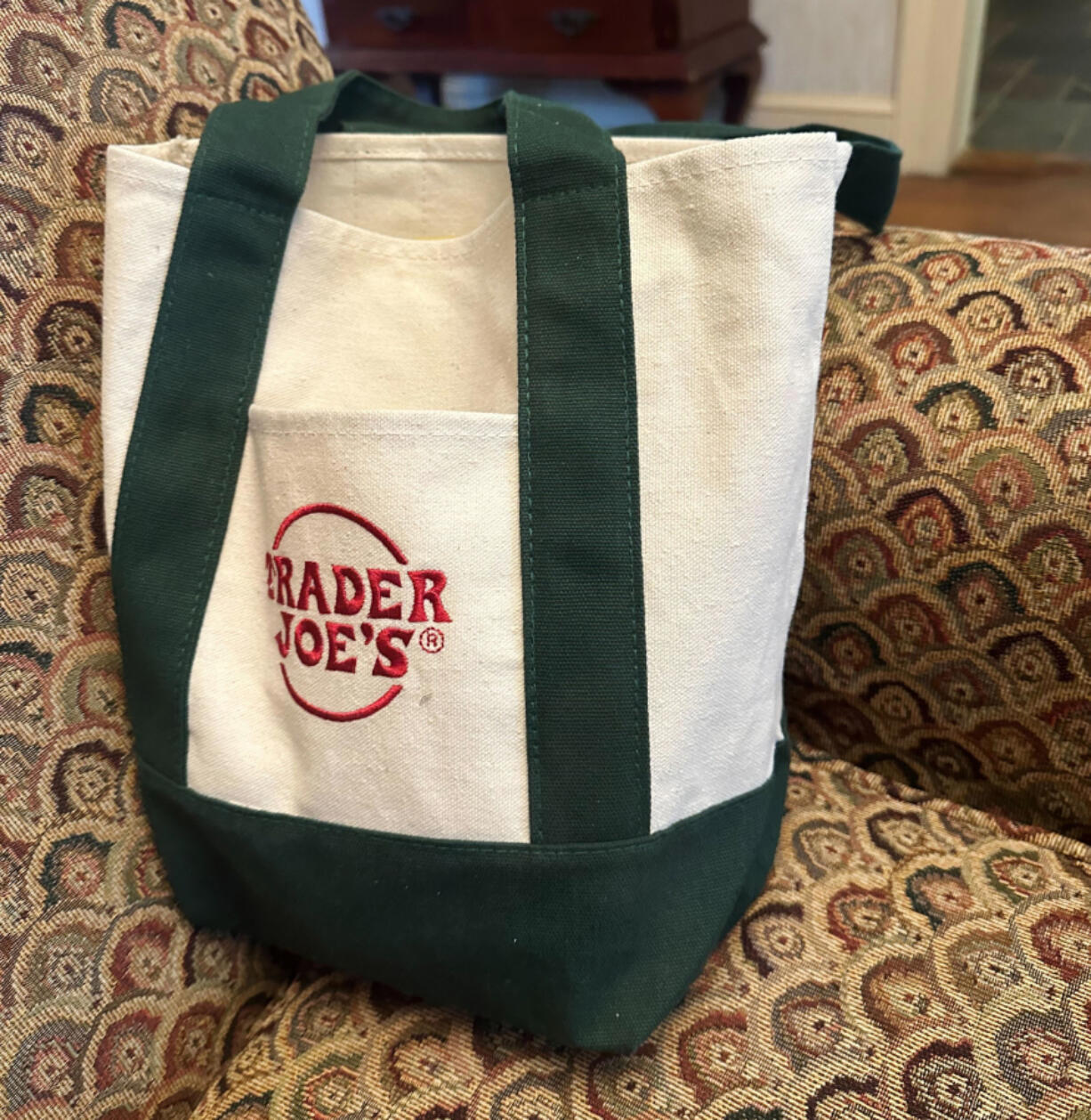 A Trader Joe&rsquo;s mini tote bag is shown in Round Top, N.Y., on Saturday, March 2, 2024. The bag is the latest item to cause a stir on social media, so much so that resellers are taking advantage of the hype.