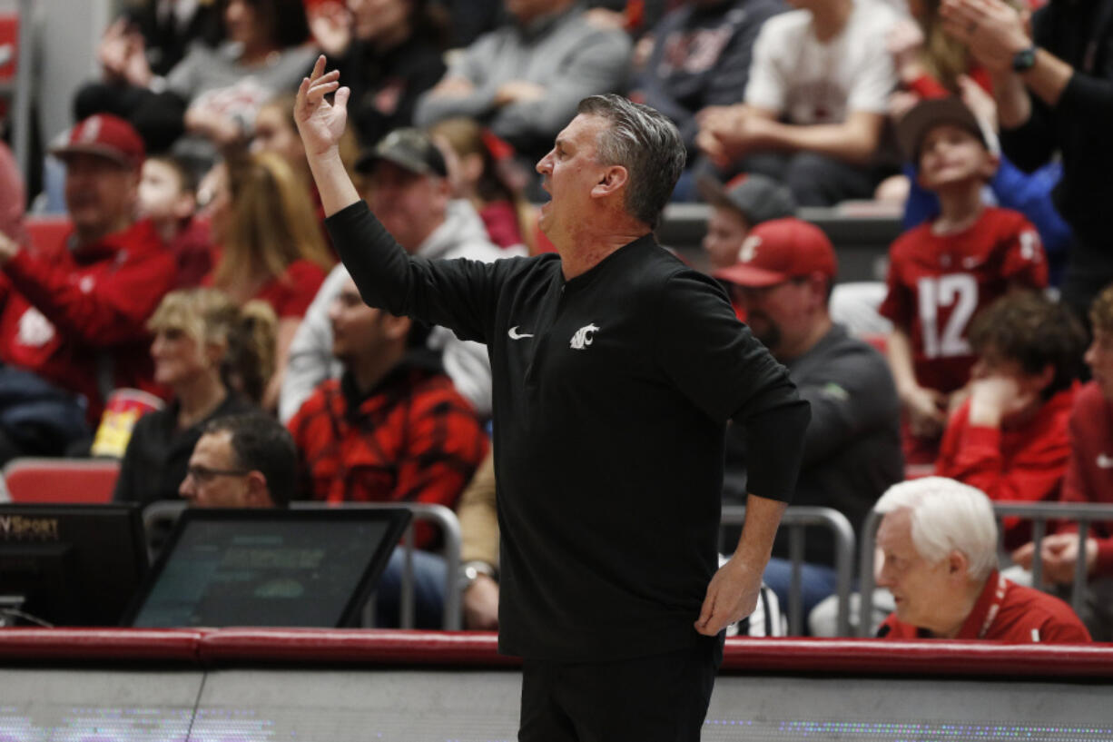 Washington State head coach Kyle Smith directs his team during the first half of an NCAA college basketball game against Southern California, Thursday, Feb. 29, 2024, in Pullman, Wash.