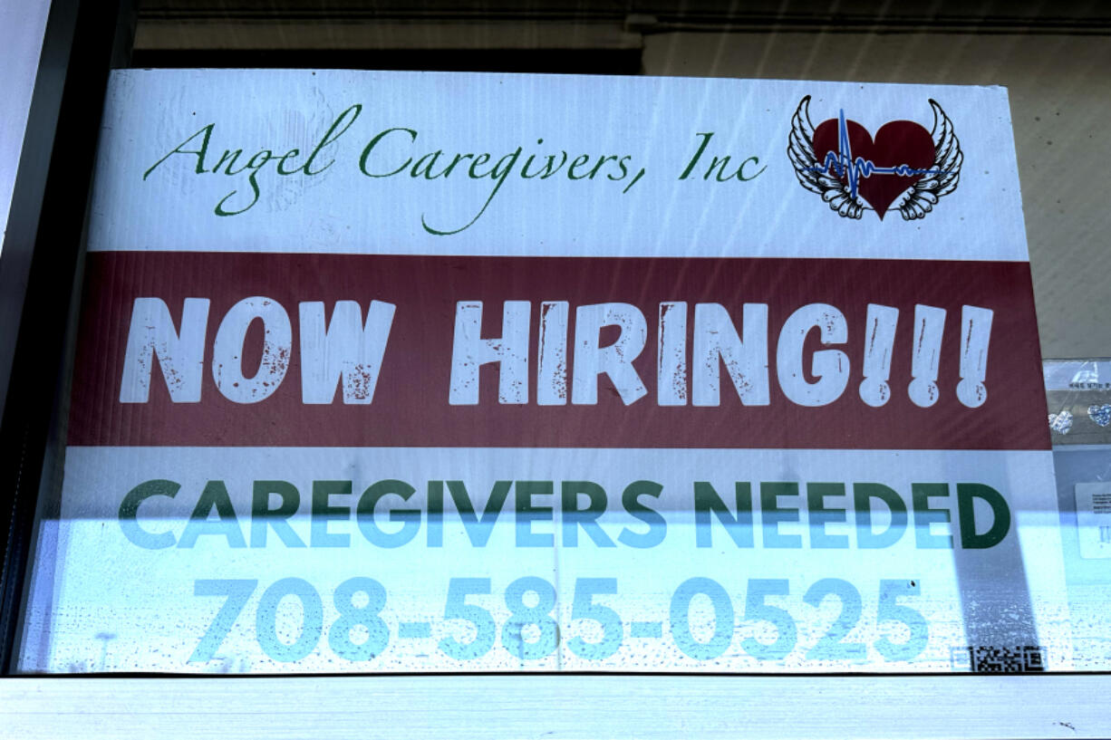 A hiring sign is posted in Niles, Ill., Sunday, March 3, 2024. On Thursday, March 7, 2024, the Labor Department reports on the number of people who applied for unemployment benefits last week. (AP Photo/Nam Y.