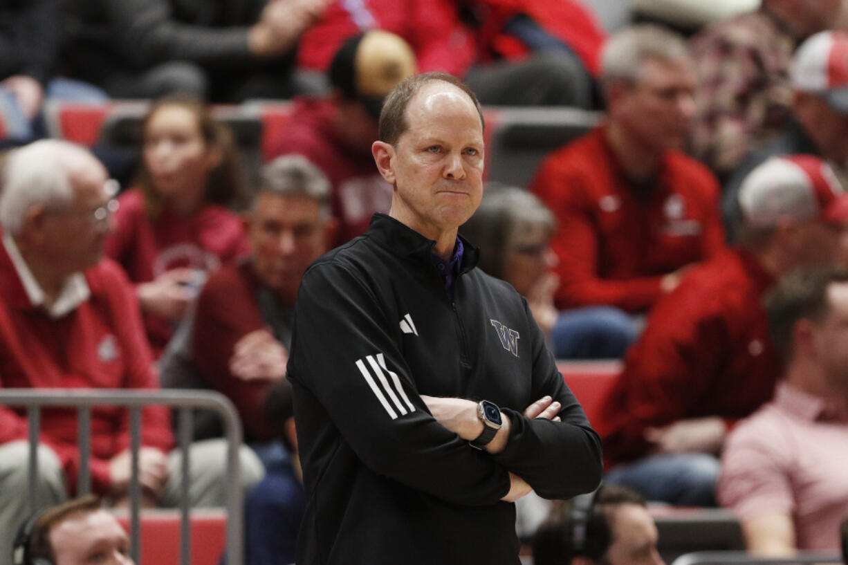 Washington head coach Mike Hopkins watches the first half of an NCAA college basketball game against Washington State, Thursday, March 7, 2024, in Pullman, Wash.