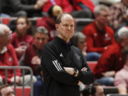 Washington head coach Mike Hopkins watches the first half of an NCAA college basketball game against Washington State, Thursday, March 7, 2024, in Pullman, Wash.