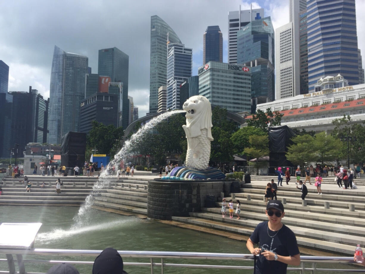 Craig Brown/The Columbian
Singapore&rsquo;s Merlion Park, above, is too bright to be a good place to read The Columbian, but any of the city&rsquo;s Toast Box cafes would be an excellent choice.
