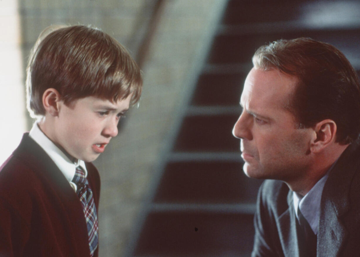 Haley Joel Osment, left, and Bruce Willis in &ldquo;The Sixth Sense.&rdquo; (Hulton Archive)