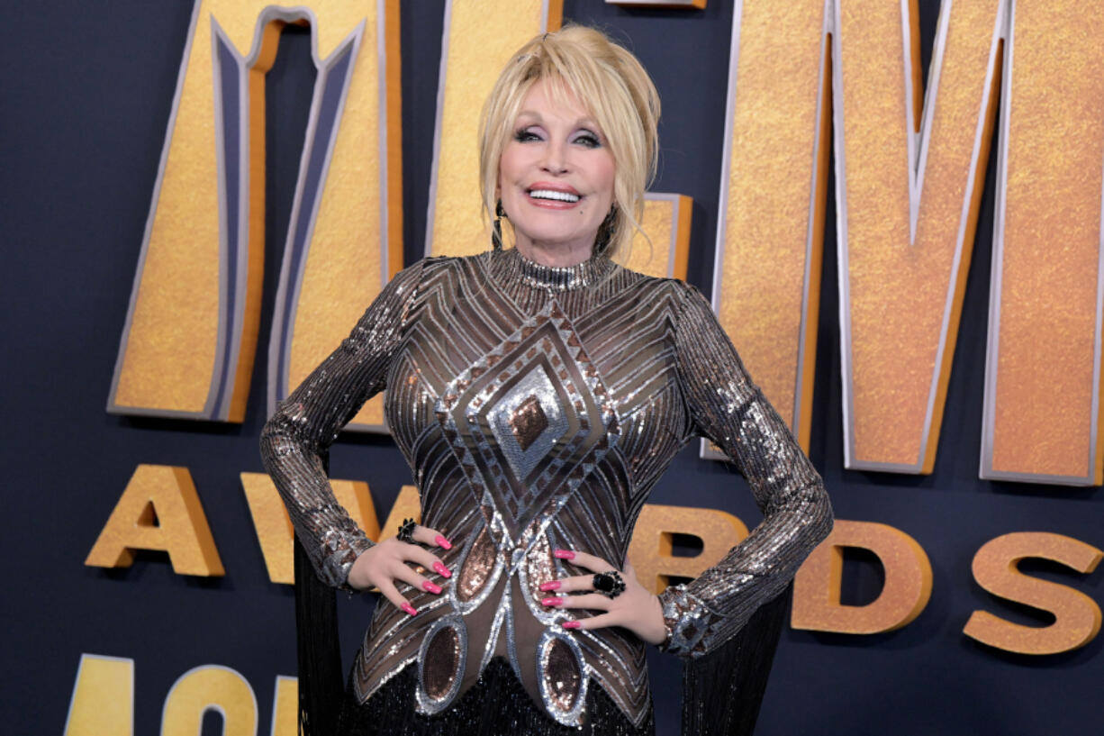 Singer and songwriter Dolly Parton arrives for the 57th Academy of Country Music awards on March 7, 2022, in Las Vegas.