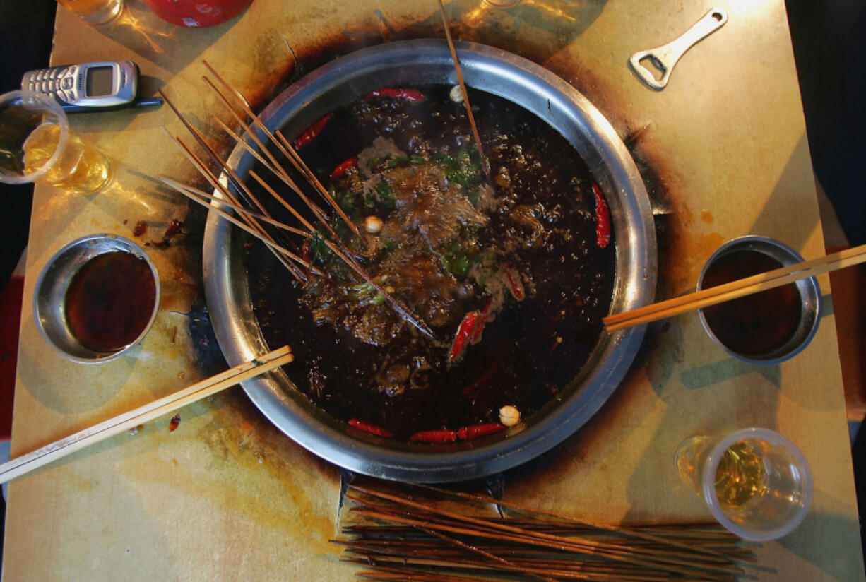 &ldquo;Malatang&rdquo; snack hot pot is seen on May 10, 2005, at a street booth in Chongqing Municipality, China.