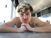 Jakob Nowell of Sublime sits March 22 at Chuck&rsquo;s Coffee Shop in Long Beach, Calif.