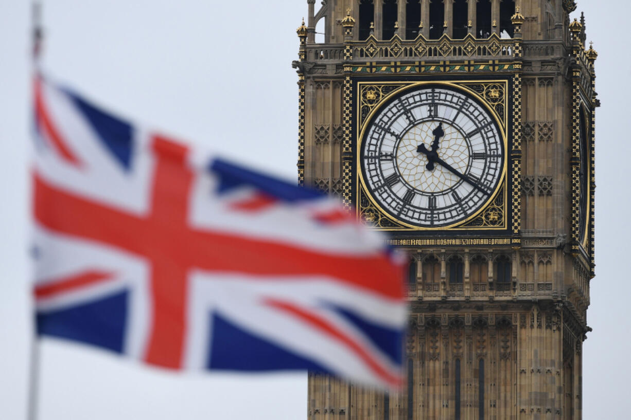 A Union flag flies near the Elizabeth Tower, commonly referred to as Big Ben, at the Houses of Parliament in London on March 29, 2017.