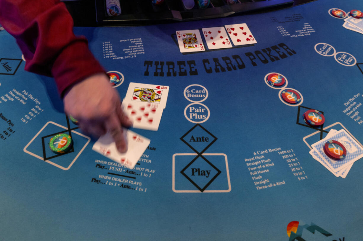 A card dealer at a gaming table in the Northern California Karuk tribe&rsquo;s Rain Rock Casino on Feb. 6 in Yreka, Calif.