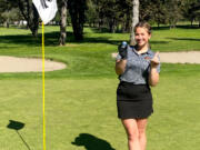 Woodland High senior Brooklyn Gaston made a hole-in-one at the No. 3 hole at Lewis River Golf Course on Wednesday in the non-league match against Battle Ground. Gaston shared medalist honors with a 42.
