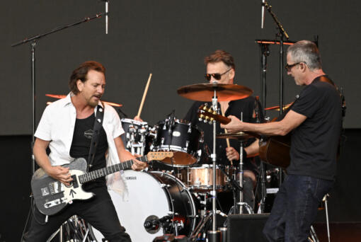 From left, Eddie Vedder, Matt Cameron and Stone Gossard of Pearl Jam perform onstage in Hyde Park on July 8, 2022, in London.