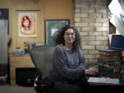 Software developer Lisa Mabley works from her home office on Monday April 15, 2024, in Minneapolis. Mabley was laid off from her job a year ago and applied to 300 places before finding a new job. Demand for tech workers rose during the digital transportation revolution. Now, those workers are being laid off or can&rsquo;t find employment.