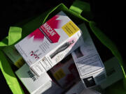 A bag of Narcan, a brand of the opioid overdose reversal drug naloxone, stands at the ready April 4 at a homeless encampment in downtown Vancouver.