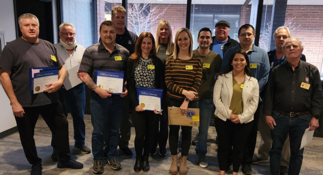 Ridgefield Lions welcomed new members March 27. Front row, left to right: new members Brian Kalbfleisch, Jason Jones, Kristy Jones, Traci Odem, Magdalena Butler and sponsor Woody Ennis.