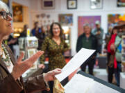 Susan Dingle, the 2024 Clark County poet laureate, recites poems at the Attic Gallery April 5 in Camas.