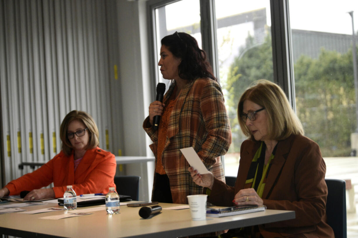 Rep. Monica Stonier, D-Vancouver, center, answers a question during a 49th Legislative District town hall on Saturday at Fourth Plain Community Commons in Vancouver. The event was also attended by Sen. Annette Cleveland, left, and Rep. Sharon Wylie, right.
