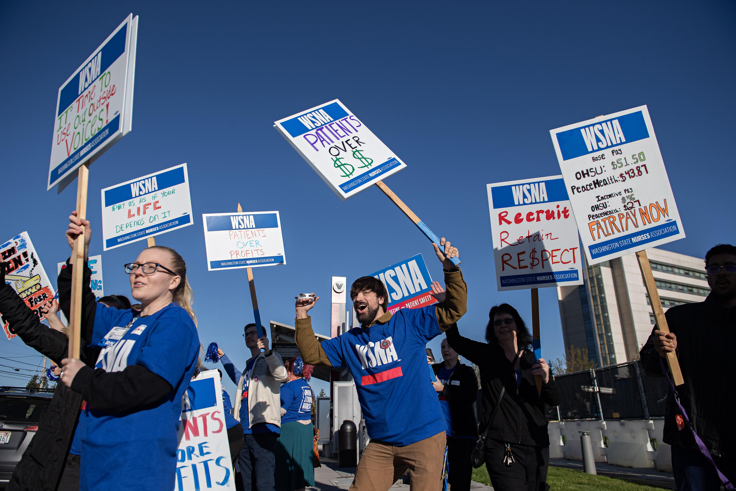 Dozens of nurses gather outside PeaceHealth Southwest Medical Center while taking part in an informational picket Thursday morning, April 18, 2024. Demonstrators, who said care was not impacted during the event, were fighting for safe staffing and fair wages.