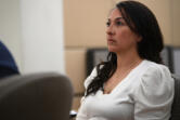 Vancouver Police Officer Andrea Mendoza listens to opening statements in her trial for gross misdemeanor assault Thursday at the Clark County Courthouse. Mendoza is accused of assaulting a man she was arresting and threatening to use a Taser on his genitals.