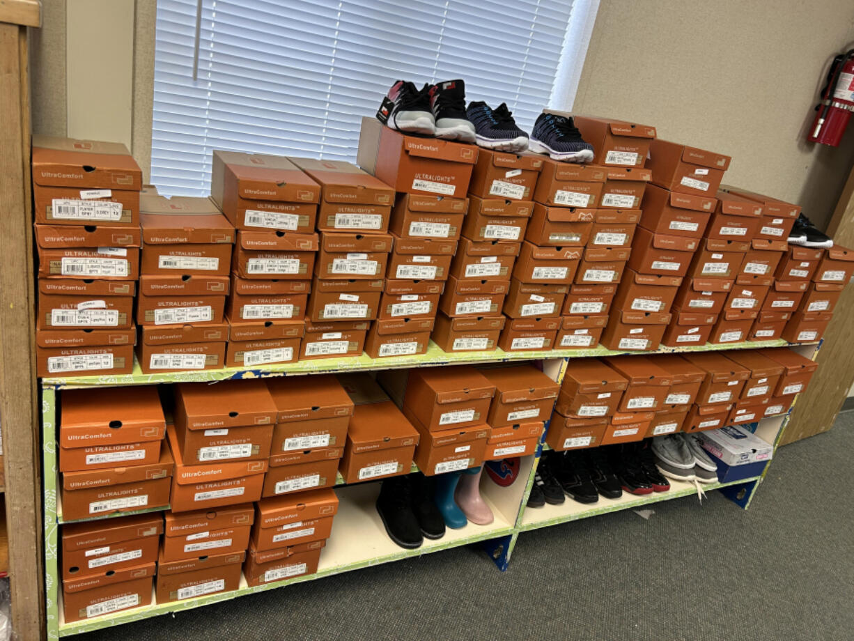 The Assistance League of Southwest Washington recently donated socks, leggings and more than $1,000 worth of shoes for Woodland students in need.