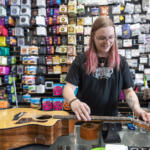 *LEADOPTION* Music World in Hazel Dell on Thursday hosted a free musical instrument string exchange where people could get new strings and their instrument restrung while supplies lasted. (Taylor Balkom/The Columbian)