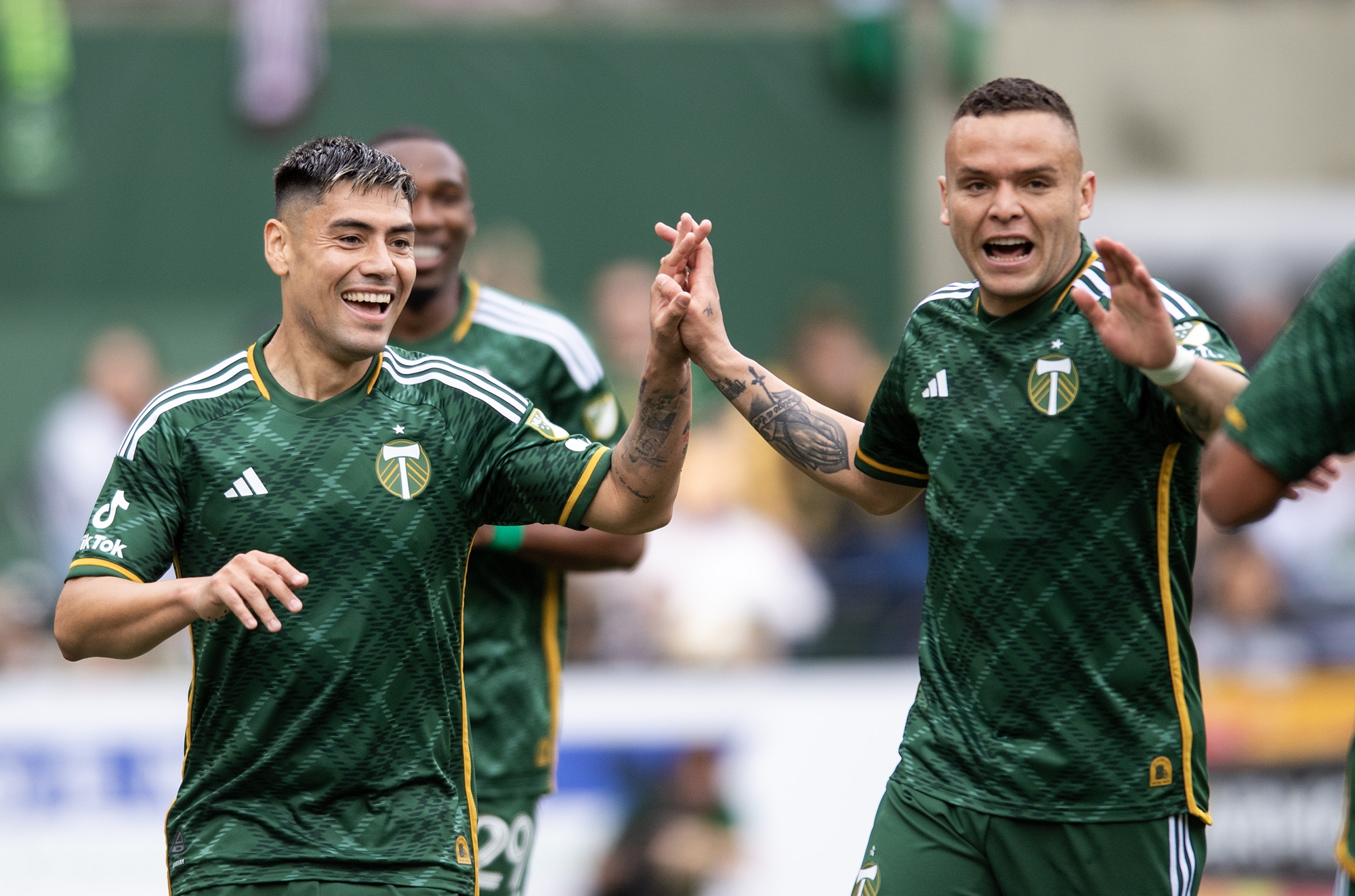 Portland Timbers forward Felipe Mora, left, and Portland Timbers forward Jonathan Rodriguez celebrate after Mora’s goal Saturday, April 13, 2024, during the Timbers’ 2-2 draw against Los Angeles FC at Providence Park in Portland.