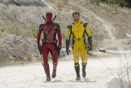 This image released by 20th Century Studios/Marvel Studios shows Ryan Reynolds as Deadpool/Wade Wilson and Hugh Jackman as Wolverine/Logan  in a scene from "Deadpool &amp; Wolverine." (20th Century Studios/Marvel Studios via AP)