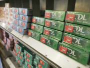 FILE - Menthol cigarettes and other tobacco products are displayed at a store in San Francisco on May 17, 2018. Anti-smoking groups filed a lawsuit against the U.S. government on Tuesday, April 2, 2024, over a long-awaited ban on menthol cigarettes, which has been idling at the White House for months.