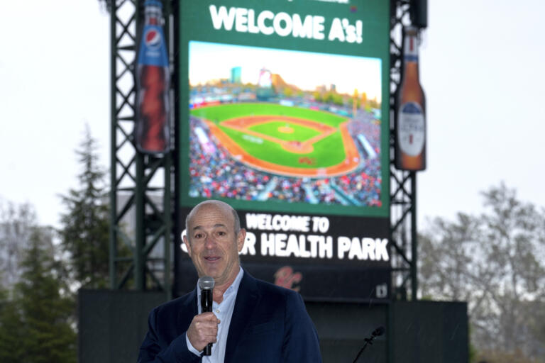 John Fisher, owner of the Oakland Athletics baseball team, announces that his team will leave Oakland after this season and play temporarily at a minor league park, during a news conference in West Sacramento, Calif., Thursday, April 4, 2024. The A's announced the decision to play at the home of the Sacramento River Cats from 2025-27 with an option for 2028 on Thursday after being unable to reach an agreement to extend their lease in Oakland during that time.