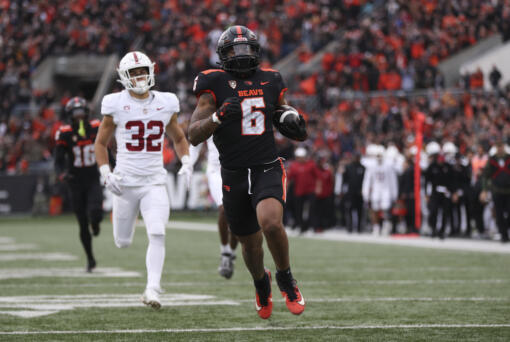 Oregon State running back Damien Martinez (6), Miami running back Henry Parrish and Pitt defensive end Jayon Hayes entered the transfer portal on Tuesday, April 16, 2024, as the 14-day spring window opened for college football players. (AP Photo/Amanda Loman, File)