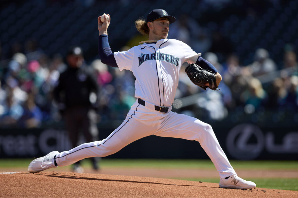 Seattle Mariners pitcher Bryce Miller throws to a Cincinnati Reds batter during the first inning of a baseball game, Wednesday, April 17, 2024, in Seattle.