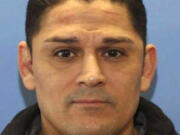 This image provided by the West Richland Police Department shows Elias Huizar. Huizar, a former Washington state police officer, was on the run Tuesday, April 23, 2024, after killing two people, including his ex-wife, who had recently obtained a protection order against him, authorities said. The Washington State Patrol late Monday issued an alert that the ex-Yakima officer had fled with 1-year-old Roman Huizar.