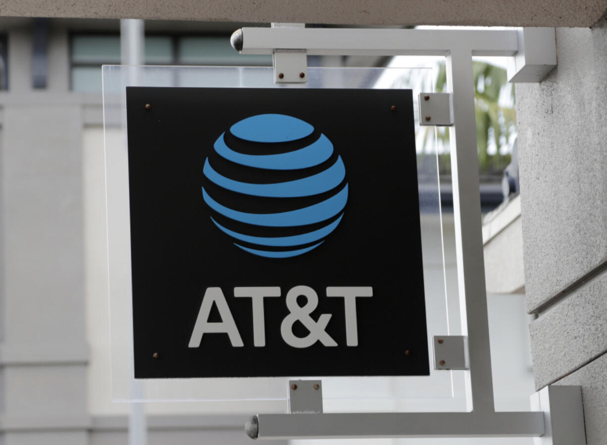 FILE - The sign in front of an AT&amp;T retail store is seen in Miami, July 18, 2019. The theft of sensitive information belonging to millions of AT&amp;T&rsquo;s current and former customers has been recently discovered online, the telecommunications giant said Saturday, March 30, 2024. In an announcement addressing the data breach, AT&amp;T said that a dataset found on the dark web contains information including some Social Security numbers and passcodes for about 7.6 million current account holders and 65.4 million former account holders.